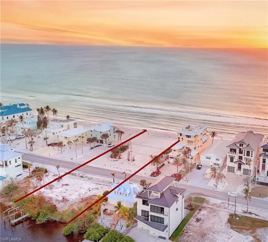 A ONCE IN A LIFETIME BEACH TO BAY LOT OPPORTUNITY on BONITA BEACH!