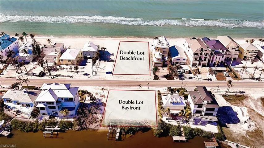 100 FT OF BEACHFRONT COUPLED WITH 100 FT OF BAYFRONT.