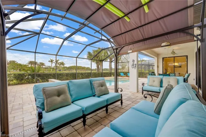 View of patio / terrace featuring outdoor lounge area and a lanai