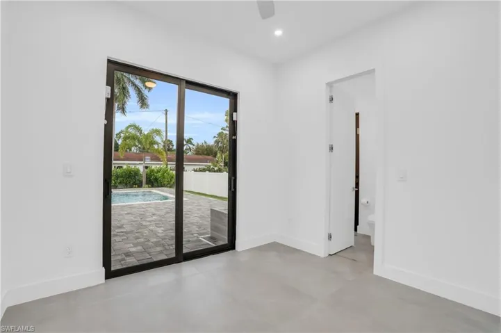 Tiled empty room with a wealth of natural light