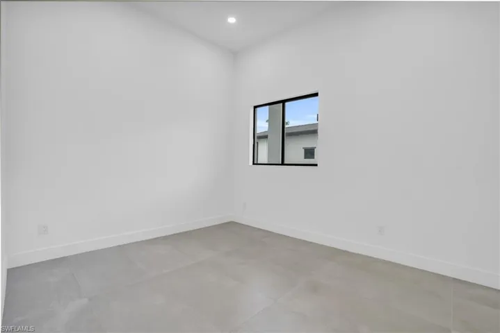 View of tiled spare room