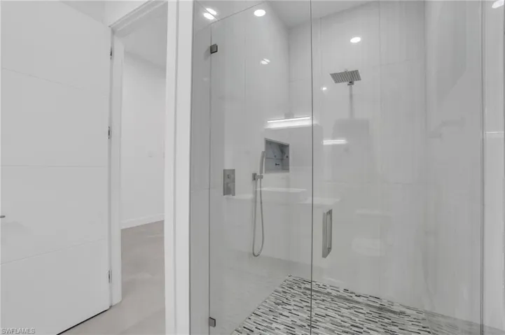 Bathroom with an enclosed shower