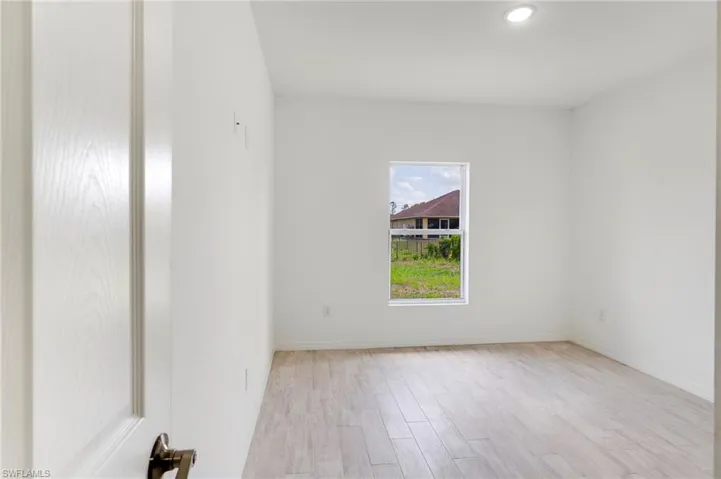 Unfurnished room featuring light hardwood / wood-style floors