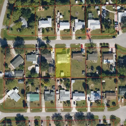 Aerial view of property's location with property parcel outlined