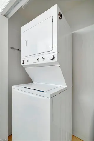 New washer/dryer located in huge guest bath closet with extra storage