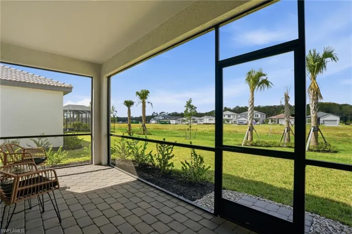 Unfurnished sunroom with a residential view
