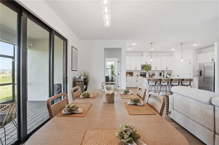 Dining room featuring recessed lighting