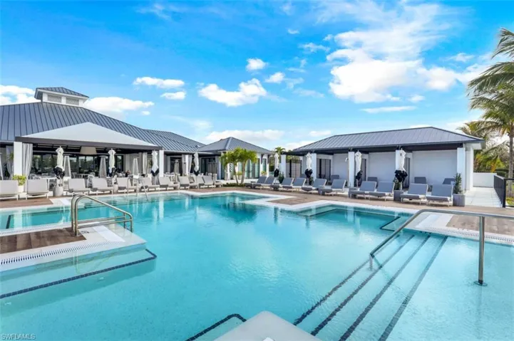 Community pool with a gazebo and a patio area