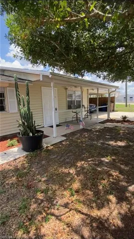 View of front of property with covered porch