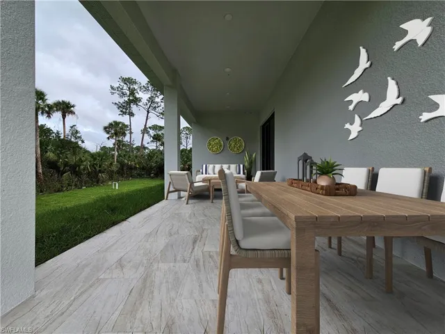 View of patio featuring outdoor dining area and an outdoor hangout area