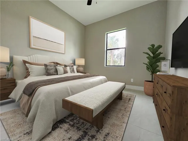 Bedroom featuring a ceiling fan and light tile patterned floors