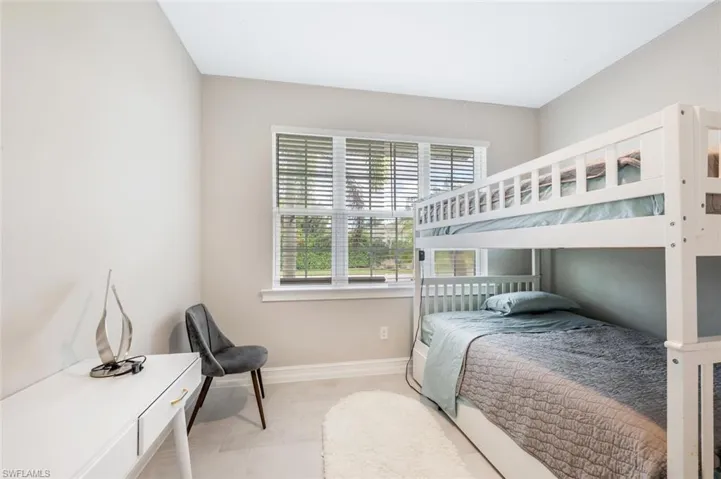 Bedroom featuring baseboards