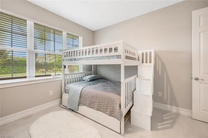 Bedroom featuring baseboards