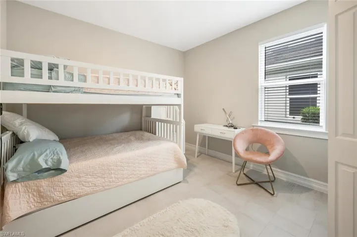 Bedroom featuring baseboards