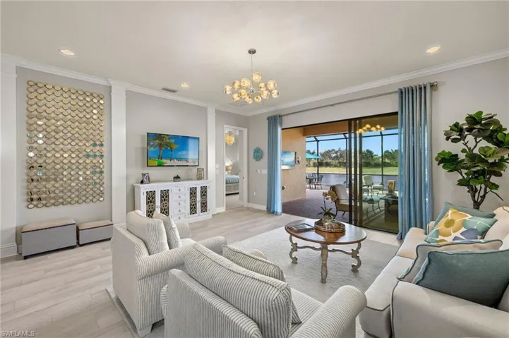 Spacious great room with sleep sofa that makes hosting family or friends a breeze; this home comfortably sleeps 8!!! Mirrored accent piece to convey. Get a load of that private, rear lake view!!!