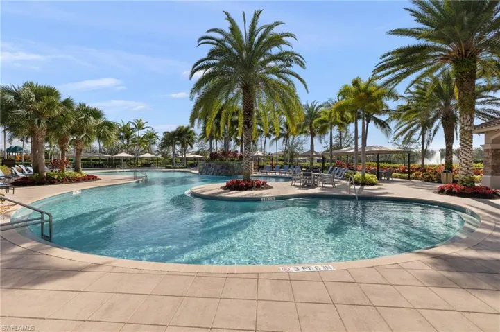Impressive resort style pool with cabanas and a tiki bar!