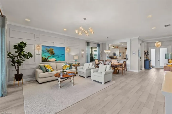 WOW! Decorative wood accent walls, crown molding, 2 year new plank flooring and tastefully furnished (see inclusion list), this Berkshire looks like a model home!!!