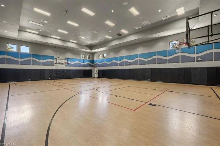 Indoor basketball court also has a pickleball net for additional pickleball court...