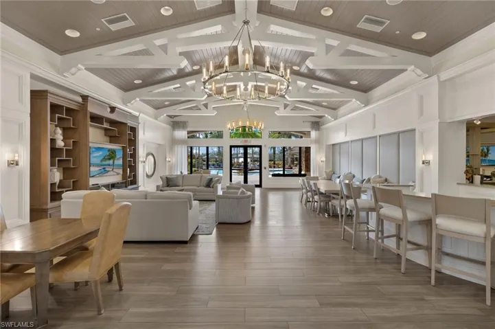 Community room adjoins pool area and features a fireplace and a kitchen!