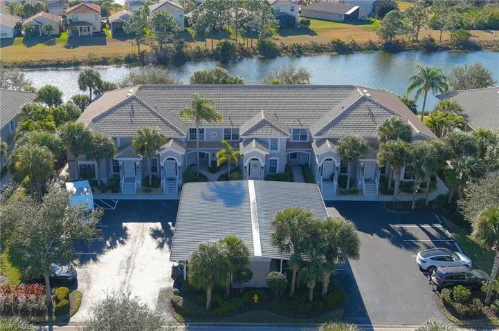Aerial view of residential area with a large body of water