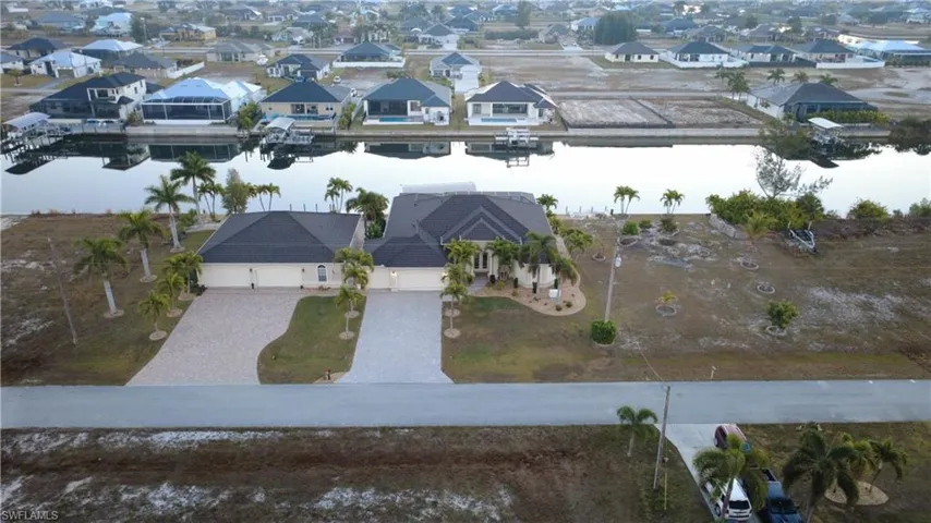 Aerial view of residential area with a nearby body of water