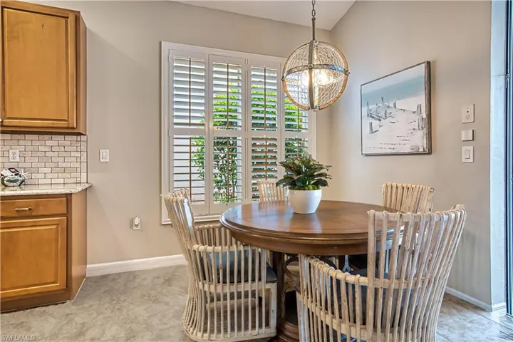 Dining space featuring tile patterned flooring