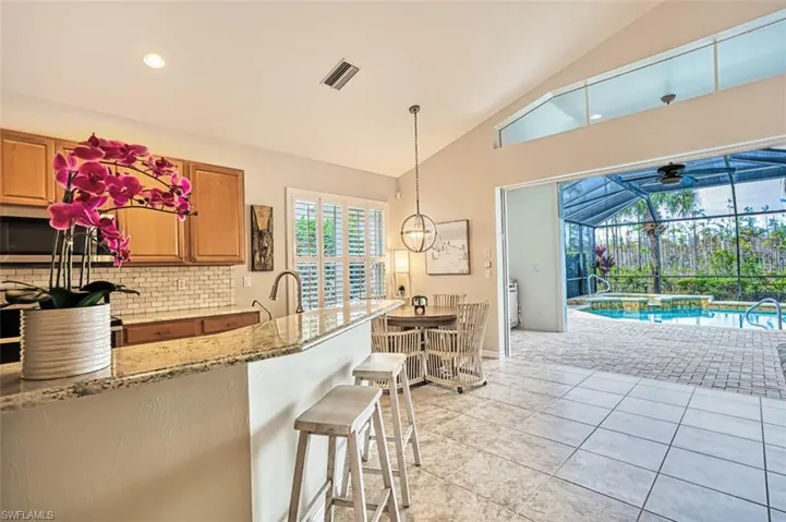 Tiled living room with ceiling fan
