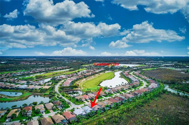Living room featuring tile patterned flooring and sink