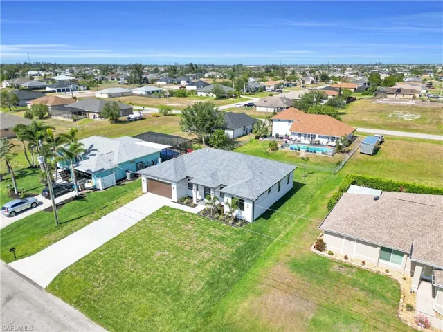 Birds eye view of property with a residential view