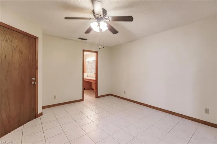 2406  Queen  DR, Lehigh Acres, FL 33971