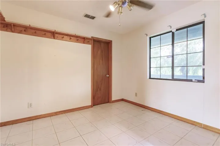 2406  Queen  DR, Lehigh Acres, FL 33971