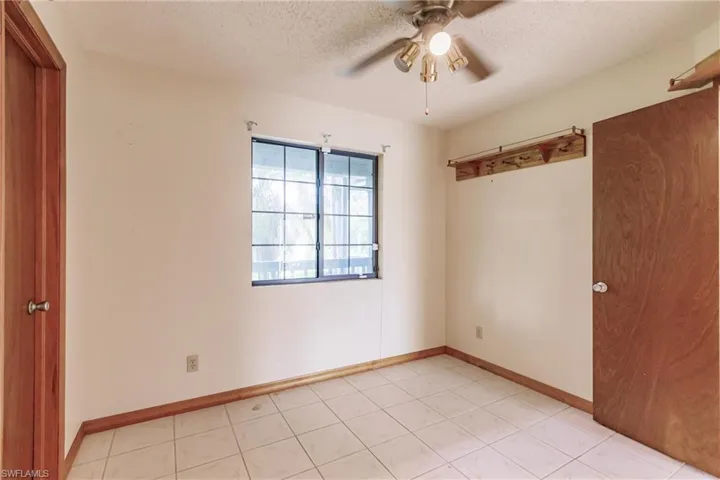 2406  Queen  DR, Lehigh Acres, FL 33971