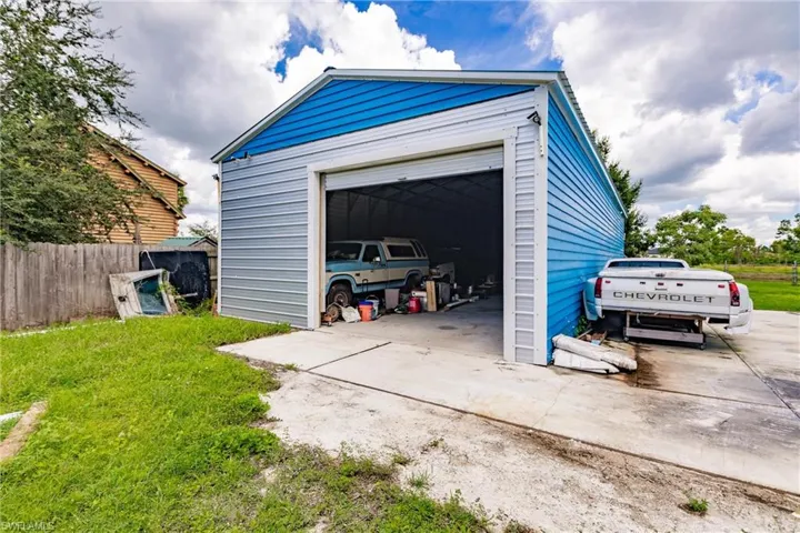 2406  Queen  DR, Lehigh Acres, FL 33971