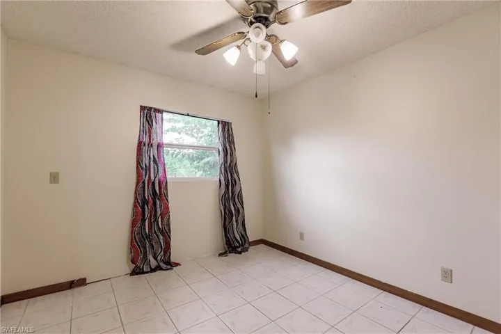 2406  Queen  DR, Lehigh Acres, FL 33971
