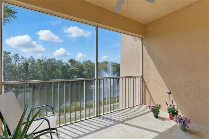 Balcony featuring a ceiling fan