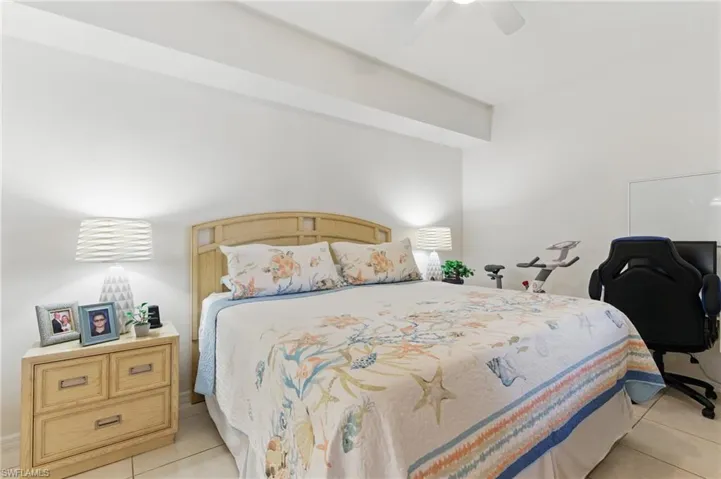 Bedroom featuring a ceiling fan and light tile patterned floors