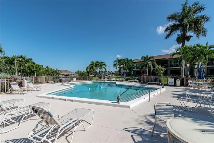 Community pool featuring a patio area