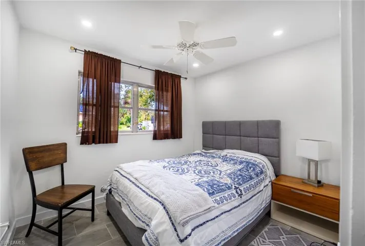 Bedroom featuring ceiling fan
