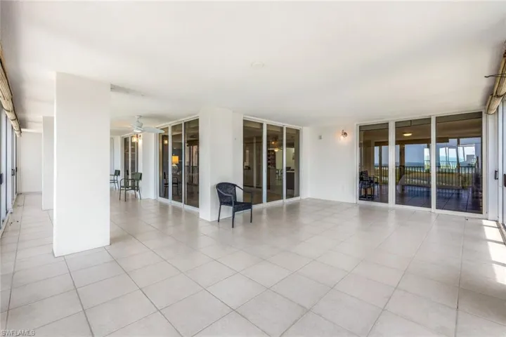 THE LARGEST LANAI IN PELICAN BAY MEASURING ALMOST NINE HUNDRED FEET!
