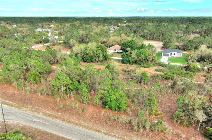 Aerial overview of property's location with a forest