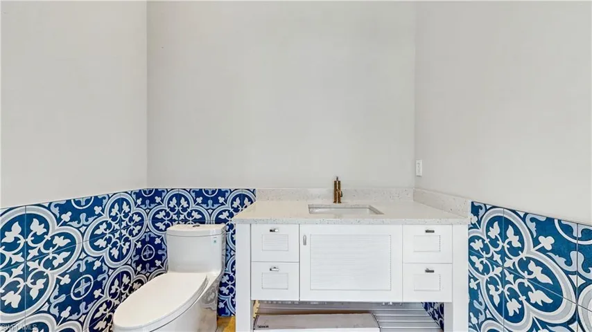 Bathroom with vanity and toilet