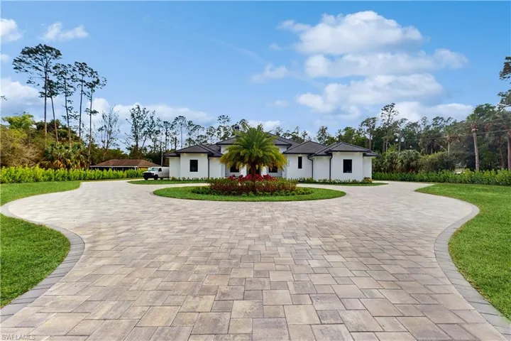 View of front of house with a front yard