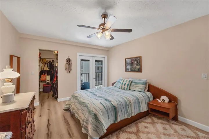 Bedroom with walk in closet