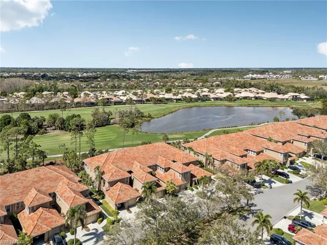 Aerial view with a water view and a residential view