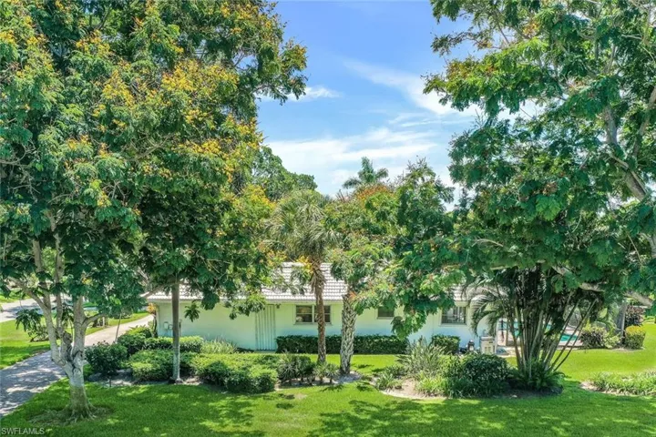 Lush vegetation surrounds the property
