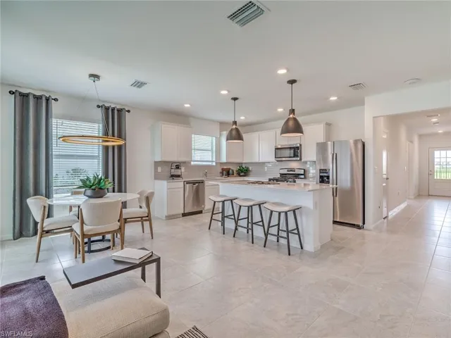 Interior photos are of a staged model home. Illustration purposes only.