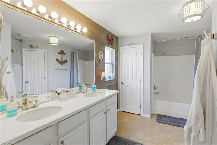 Spacious and inviting, this master bathroom is designed to feel both luxurious and practical.