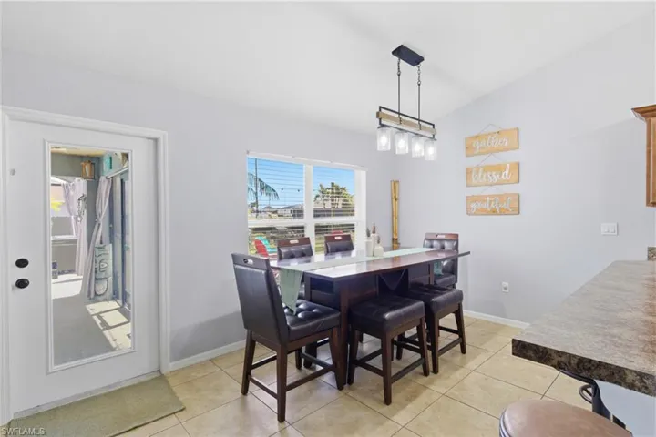 Open dining area with easy access to the outdoor entertaining space.