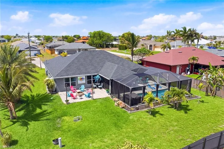 A cinematic aerial perspective that captures the scale, elegance, and outdoor experience this home so effortlessly delivers.