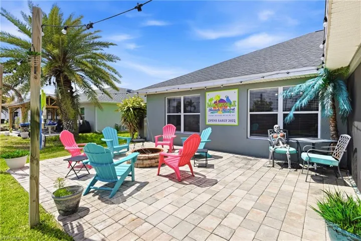 Gather around the fire pit with friends and family on a beautifully paved patio for unforgettable evenings.